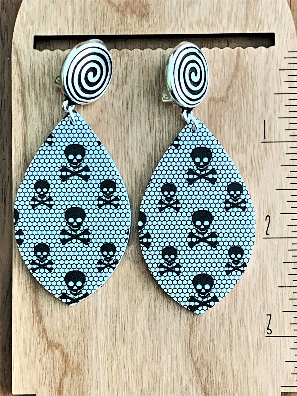 Thumbnail: Light blue dangle earrings with skull and crossbones pattern
