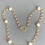 Thumbnail: Handcrafted Gold Tone Chain Necklace with White Glass Pearls