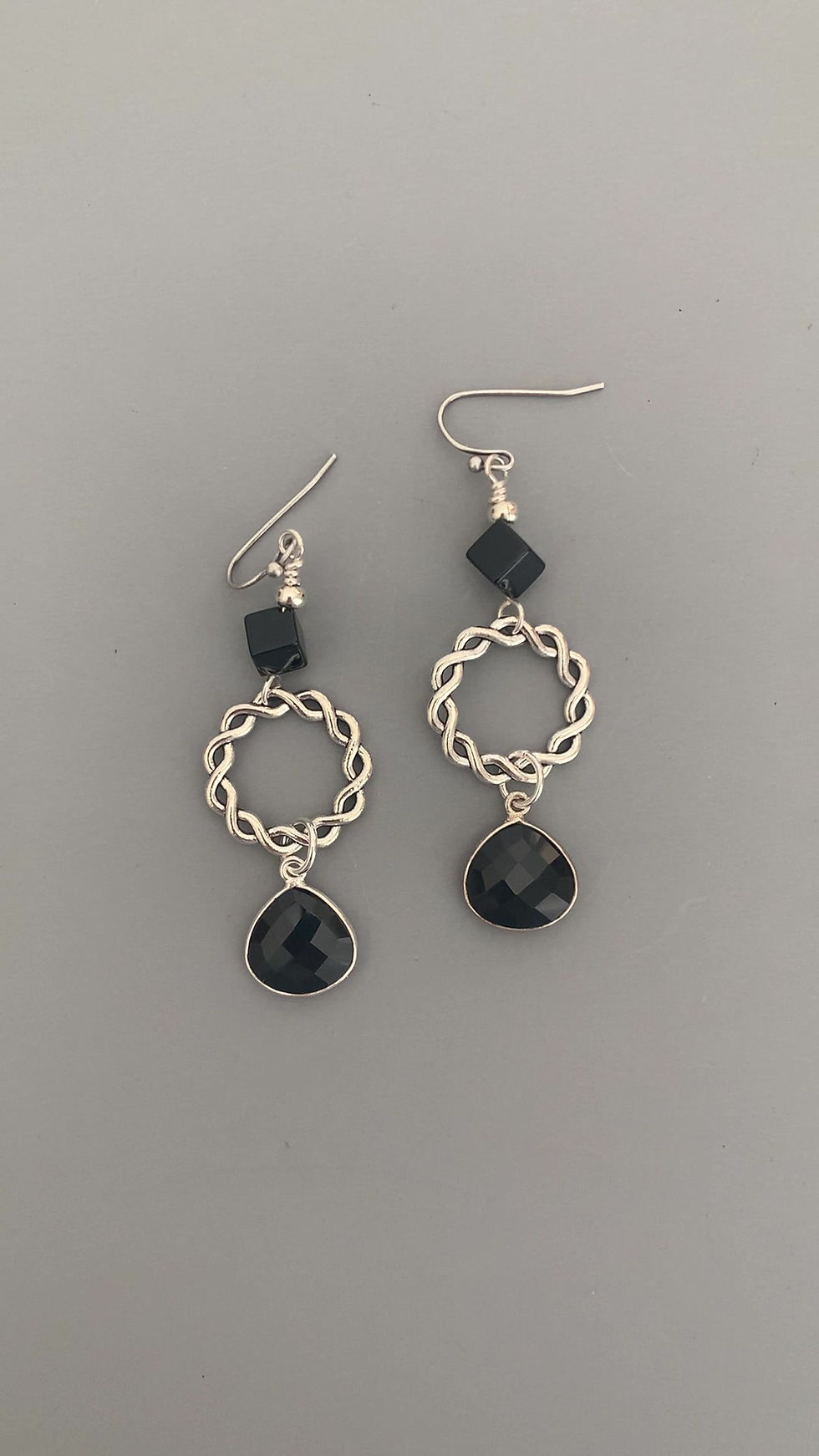 Thumbnail: A video of silver and black onyx dangle earrings