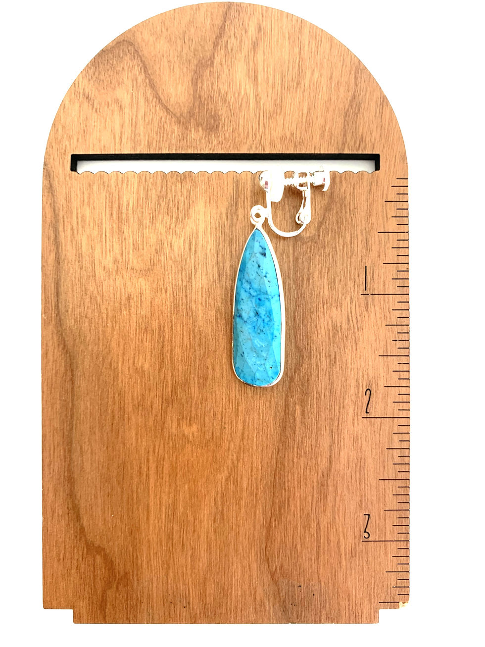 Thumbnail: Blue drop dangle earring on wood display