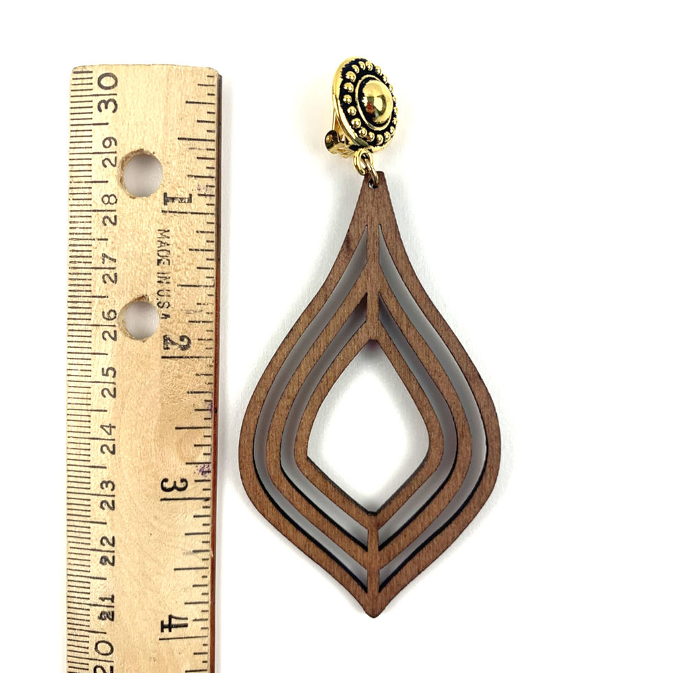 Thumbnail: Layered teardrop women's clip-on earring next to a ruler