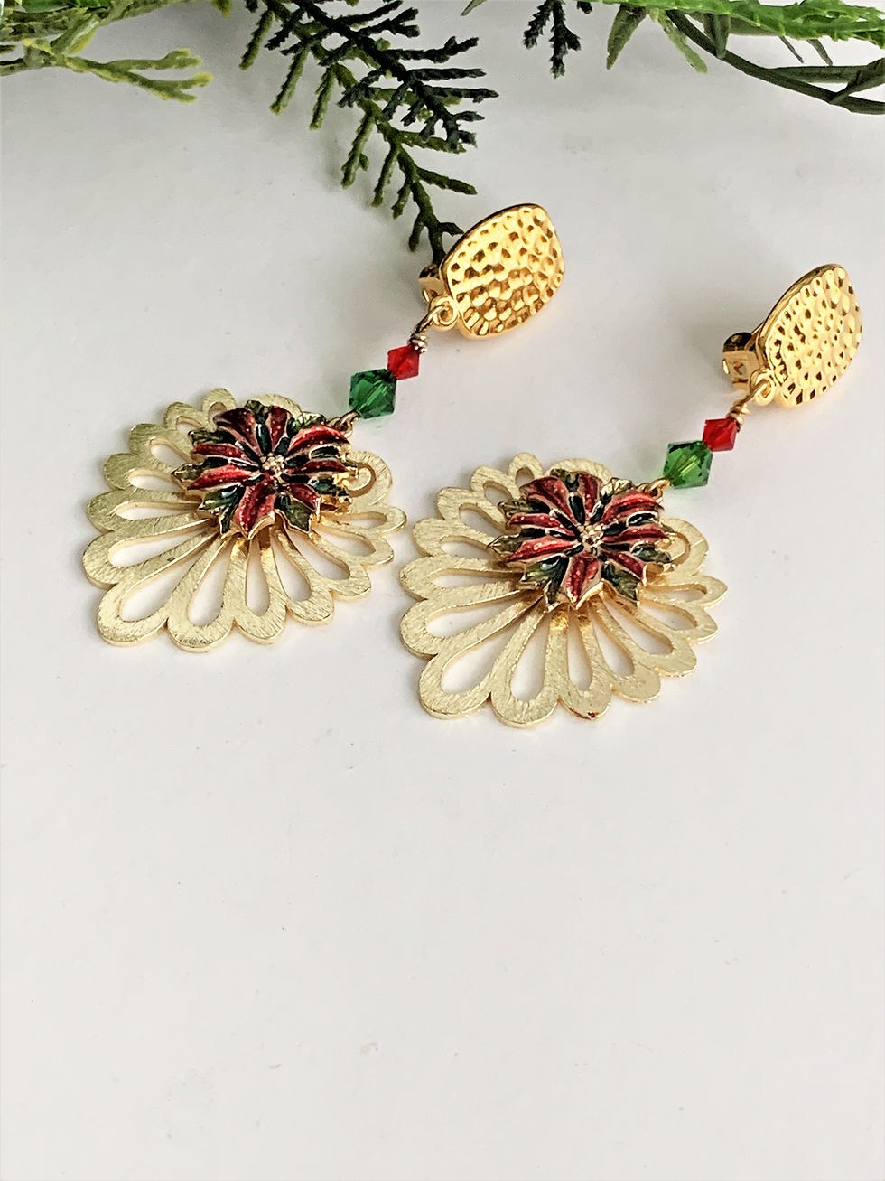 Thumbnail: Handcrafted gold flower earrings with red and green beads