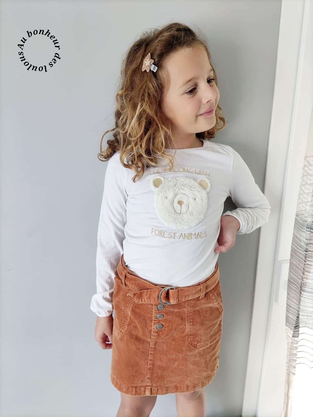 8 ans ensemble Okaïdi Teeshirt et jupe hivers ( sans barette)