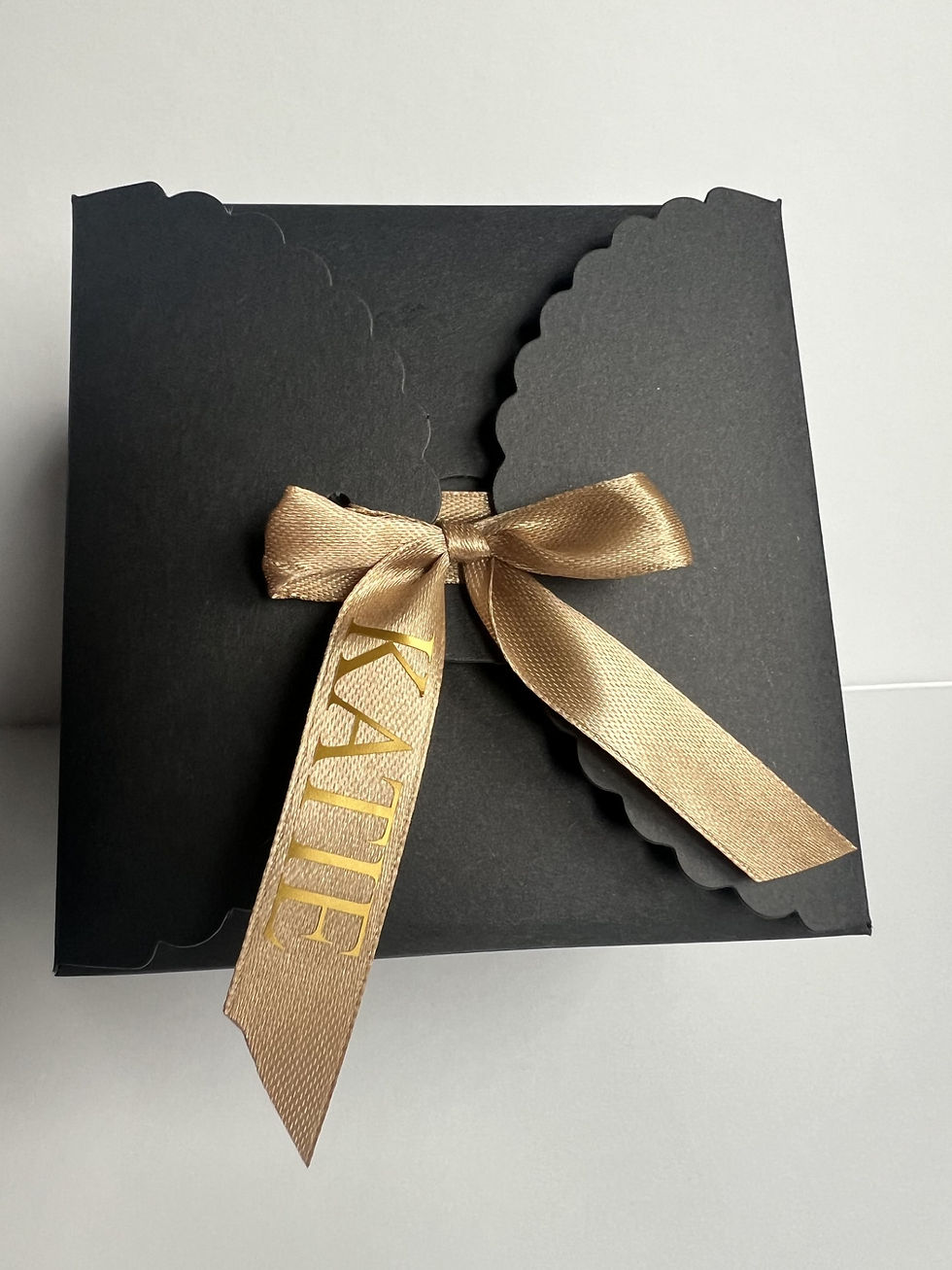 Eye-level view of a cozy living room with RainyRivers candles on a wooden table