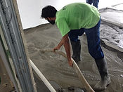 Application of ECOCON lightweight concrete screed to floor for screed arrangement