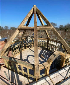 Octagonal pitched oak roof.