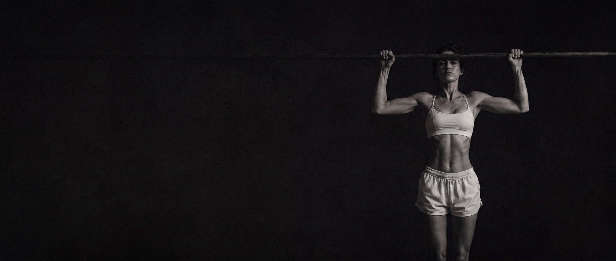 Woman training with a barbell