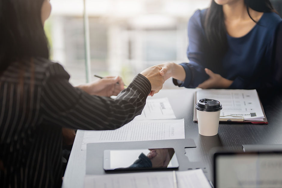 Job applicant handshake with recruiter employer after successful negotiations or interview