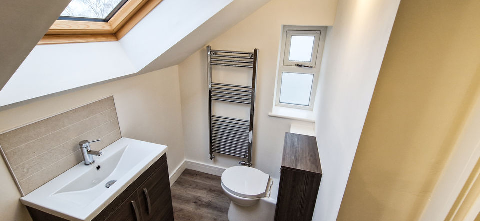 Quest bedroom with ensuite bathroom plastered by MT Plastering and Professional Finishings