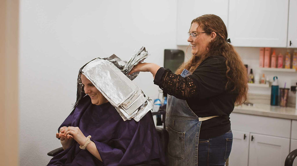 Lailani and client sharing a laugh during an appointment
