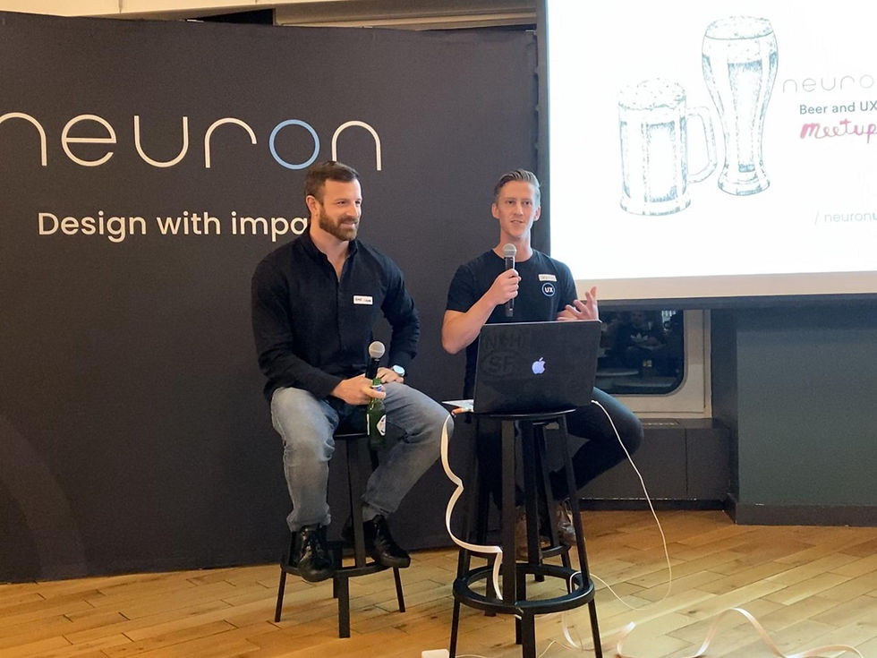Matt Stoner and Mark Munroe from Neuron speaking at an event.