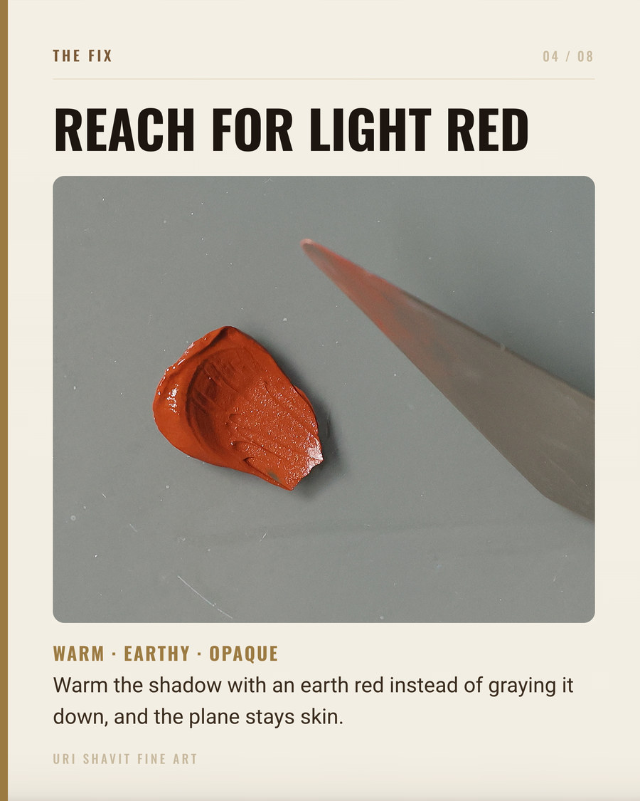 Light red oil paint squeezed from the tube showing brick-orange mass tone and thin salmon drag-out