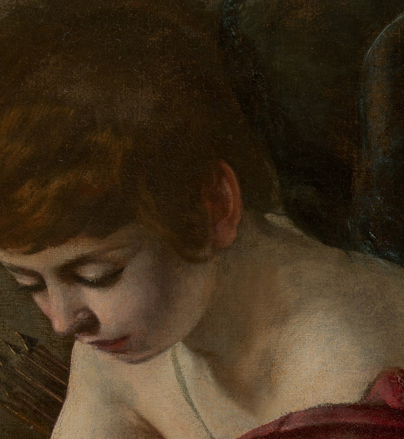 Detail of Caravaggio's The Musicians, 1597, showing the cool green-gray where the neck and shoulder turn away from the light.