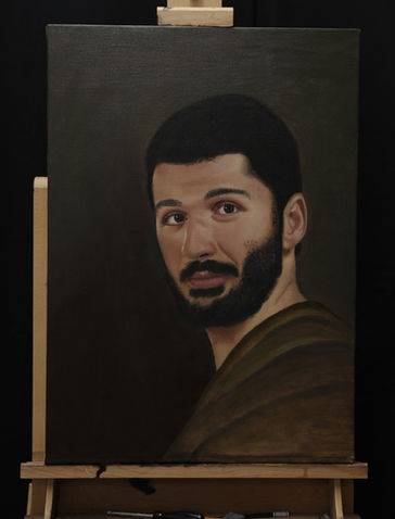 Oil portrait of a bearded young man in a green robe on a dark background