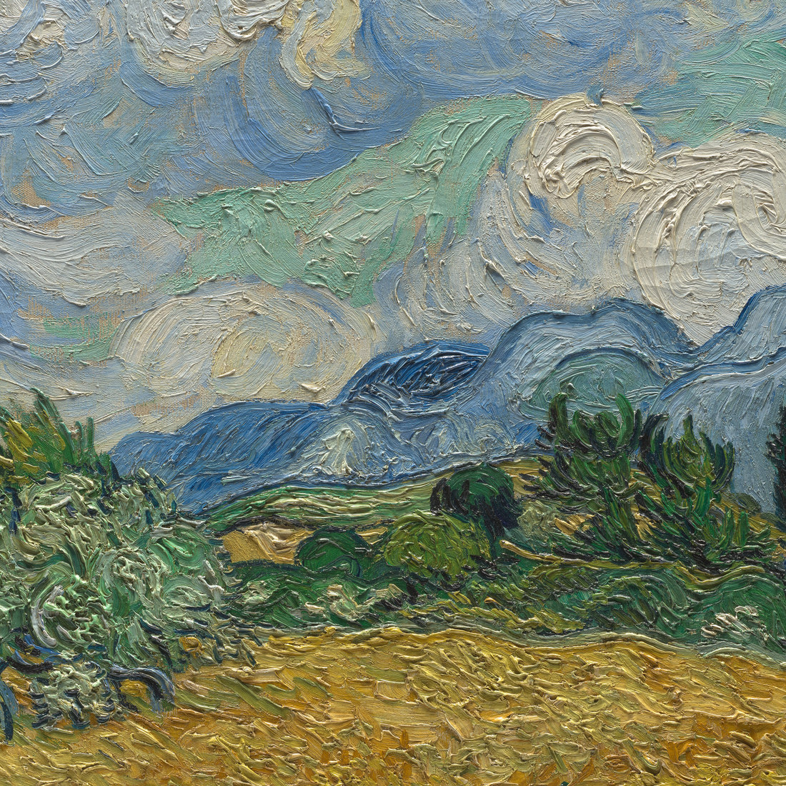 Van Gogh Wheat Field with Cypresses 1889 showing warm orange-yellow wheat against ultramarine blue sky