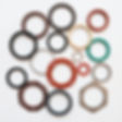 make a photo with 10 different washer and gaskets with white background and colours like r