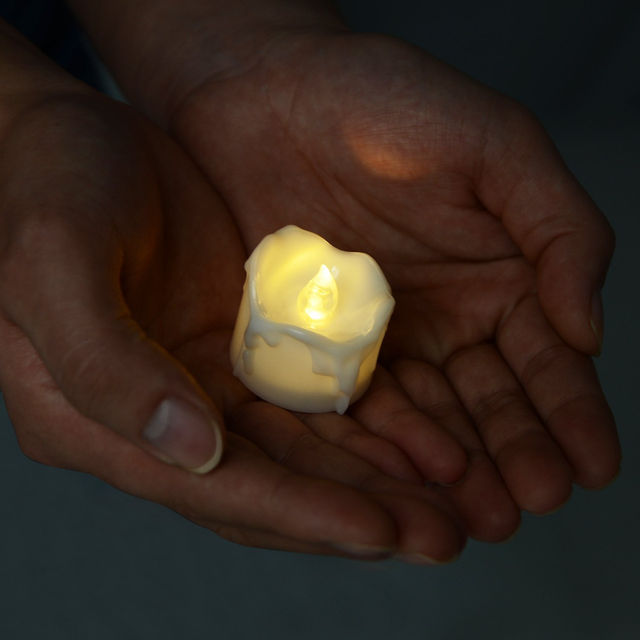 Moobom Flameless Candles, 12pcs Amber Yellow LED Tea Light Candles Dripped Battery Tealights
Offered