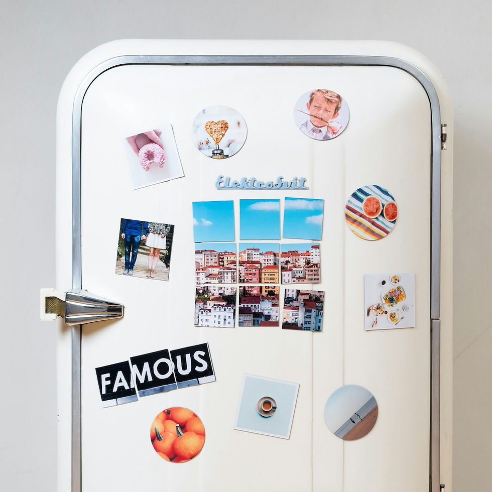 a fridge door with photos attached to it