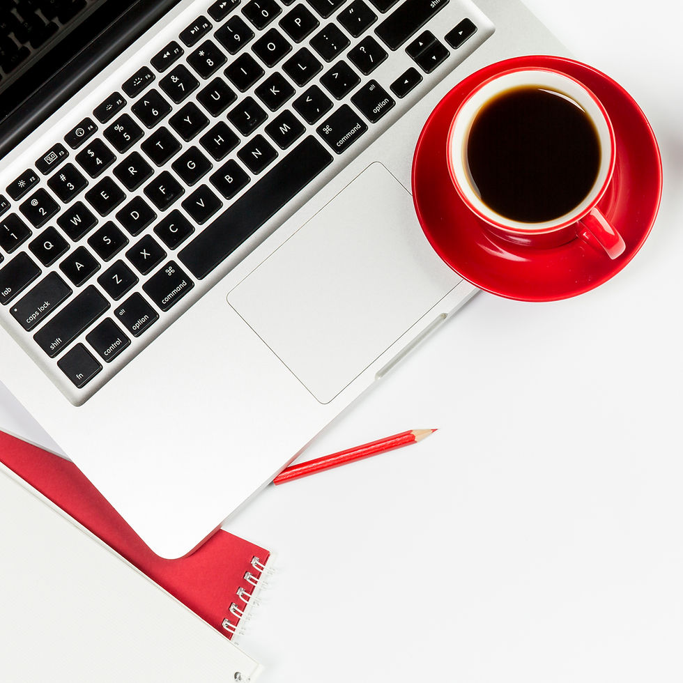 red-coffee-cup-open-laptop-white-background