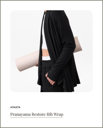 Black ribbed yoga wrap cardigan, ideal for layering during meditation, practice, or cozy lounging.