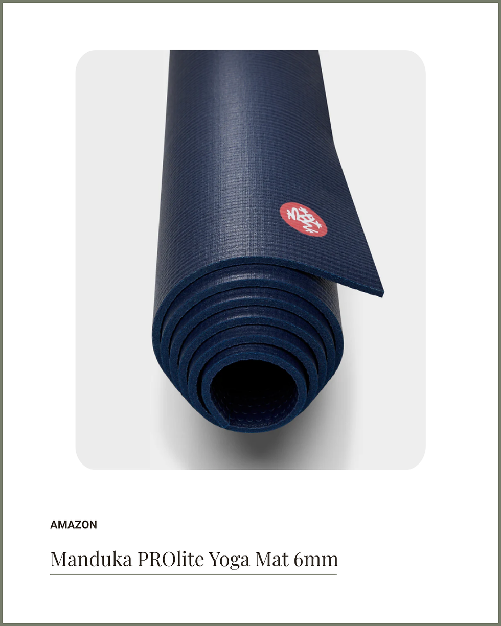Blue Manduka PROLite yoga mat rolled up with a red logo on the corner. Minimalistic white background. Text: Manduka PROLite Yoga Mat 6mm.