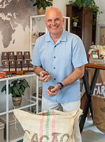 Chef Andre inspecting a new bag of cacao beans from Columbia