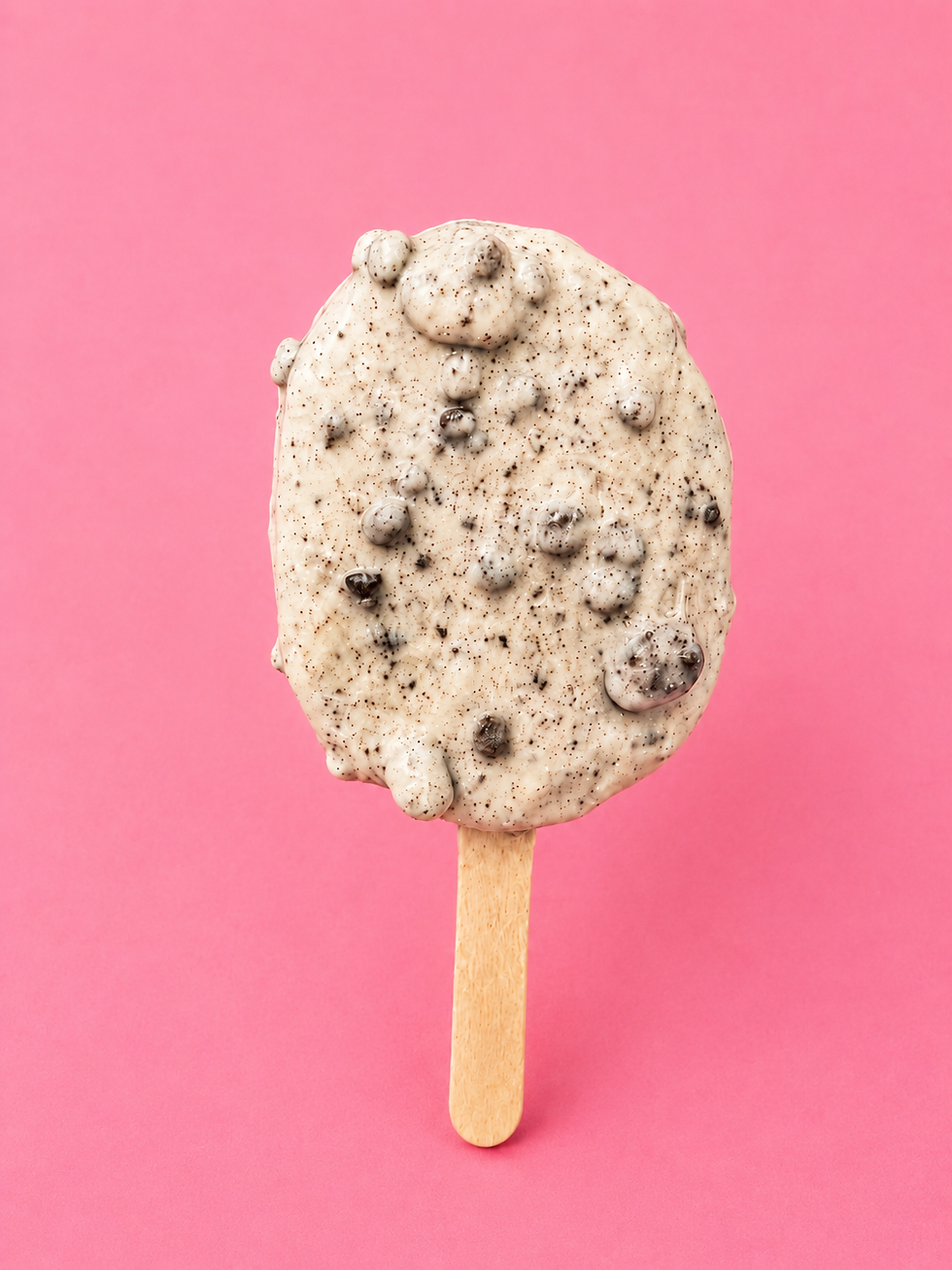 Thumbnail: Cookies and Cream cake pop from The Sweet Plug featuring white chocolate coating and cookie crumble topping