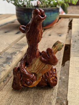 Howling Coyote in Mudslide Brown