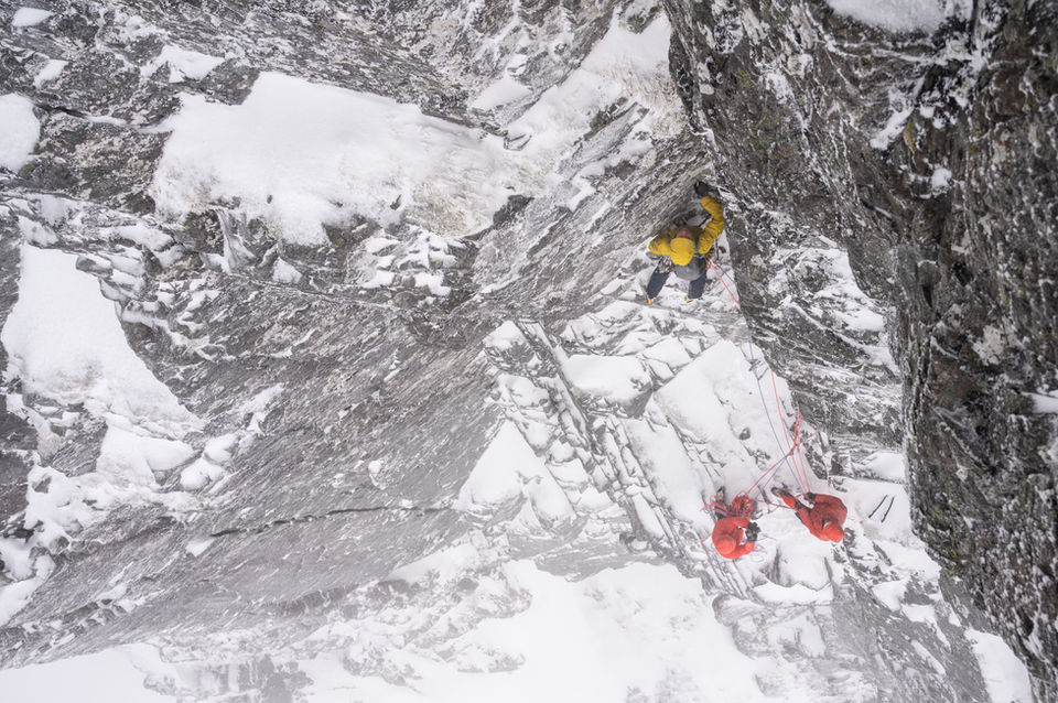 alt=“Callum Johnson, Scottish Climber, climbing a mixed winter route in Scottish Highlands during a film production of With the Seasons, a passion project by JHP Visuals"