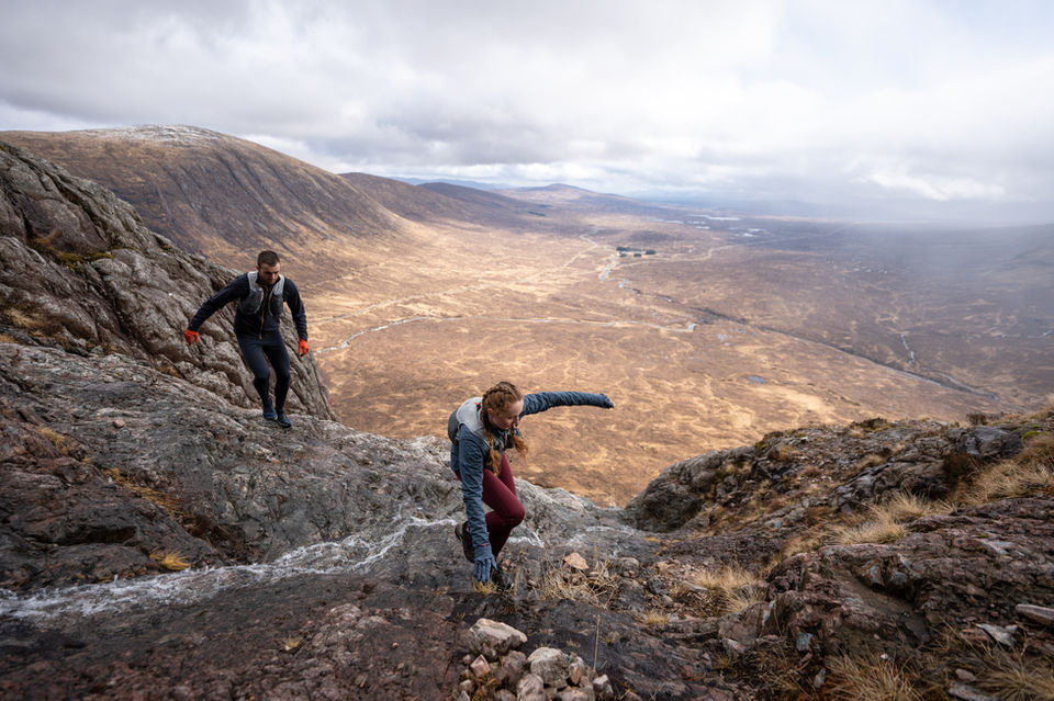 alt="two mountain runners captured in the mountains of Glencoe, Scotland during autumn winter brand campaign for RAB, produced and filmed by JHP Visuals"