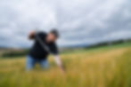 alt=“Man sampling soil in a field, captured by JHP Visuals during a film production for UNDO highlighting the environmental benefits of rock weathering"