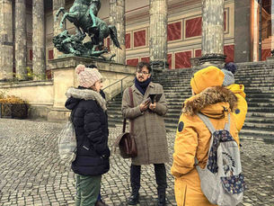 BerlinWalk guide Yusuf leading guests outside the Altes Museum on Museum Island