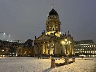 The French Cathedral on Berlin's Gendarmenmarkt square dusted with snow in February