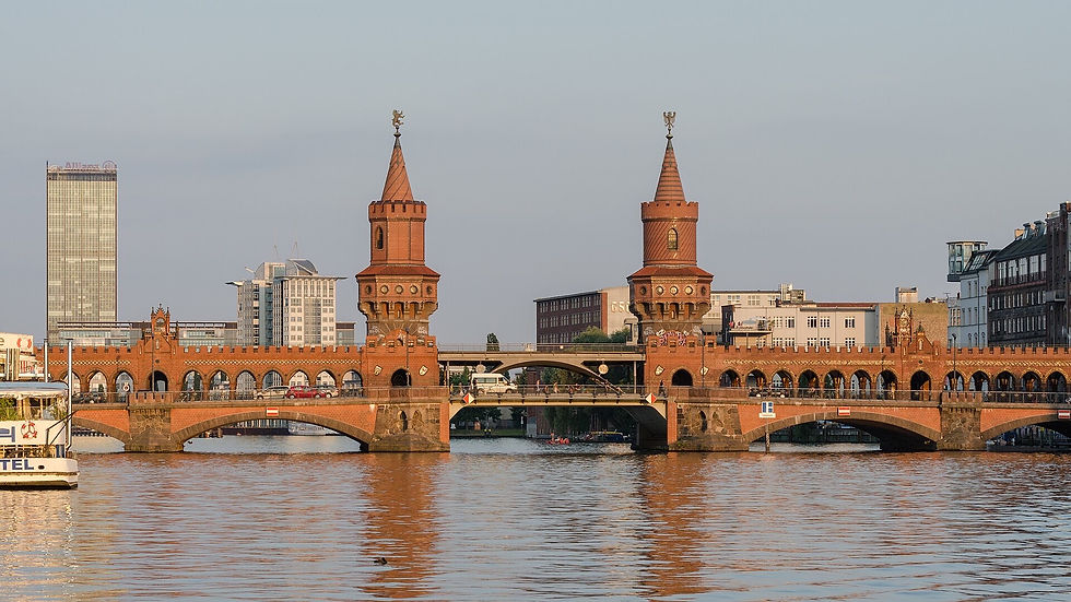 Oberbaumbrücke in Berlin at dusk, the red-brick bridge from Run Lola Run