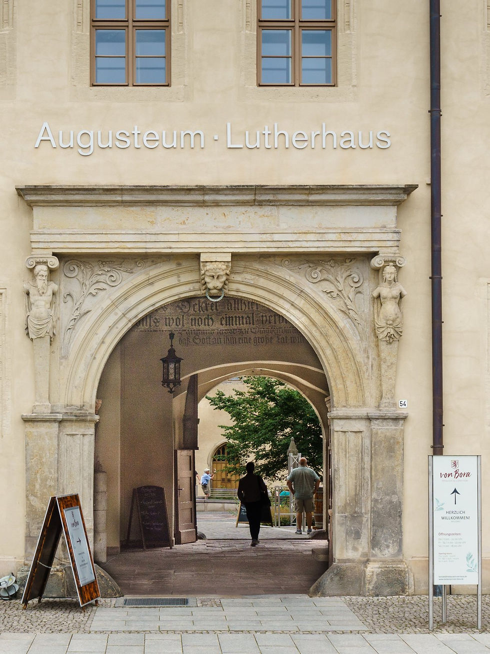 The stone portal of the Augusteum in Wittenberg leading toward the Lutherhaus