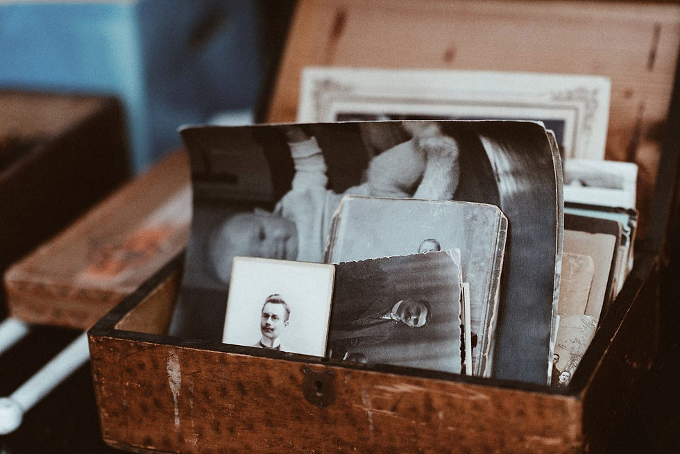 A box of old vintage photographs for sale at the Mauerpark flea market in Berlin