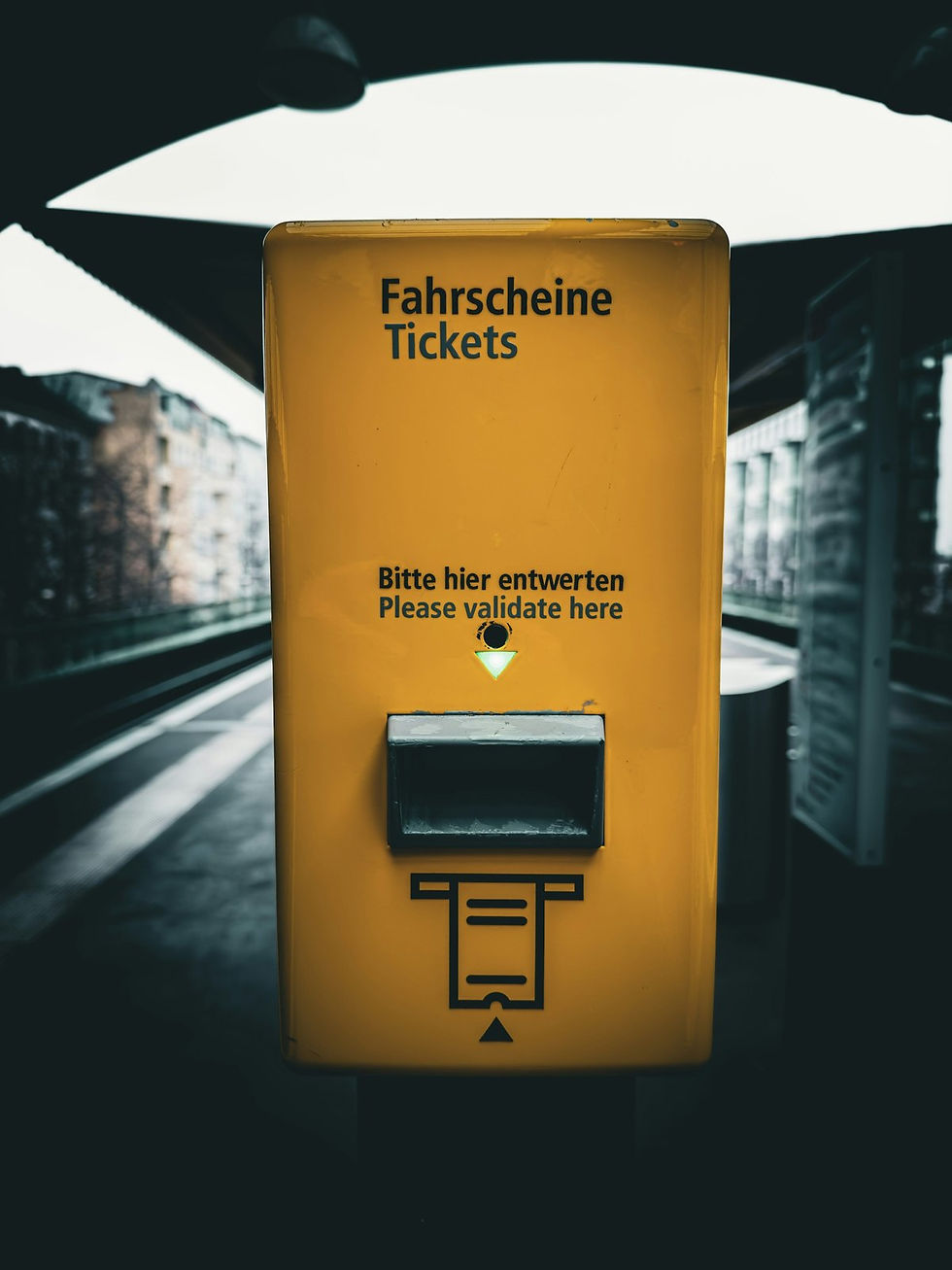 Yellow Berlin public transport ticket validator and machine used before U-Bahn, S-Bahn, tram or bus rides