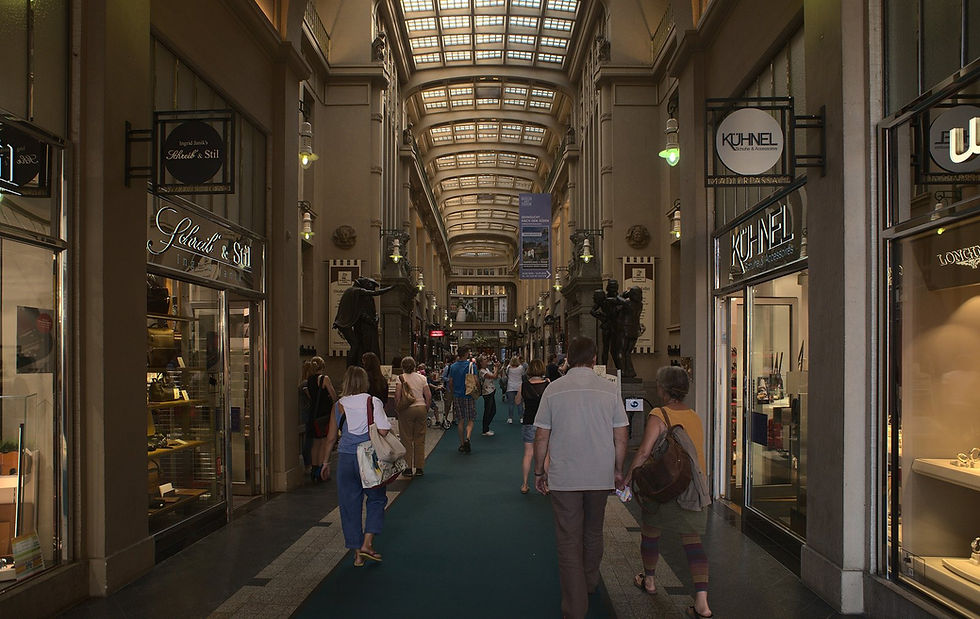 Inside the Mädlerpassage arcade in Leipzig with its glass roof and shopfronts