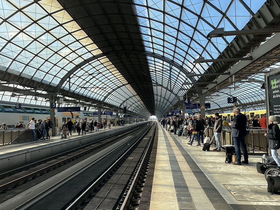 Berlin Spandau station platform under a glass roof, useful for west-side arrivals in Berlin.