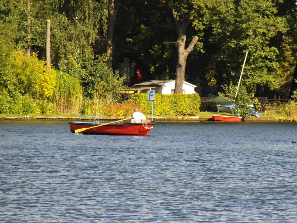 BVG F24 rowboat ferry crossing the water in Rahnsdorf Berlin