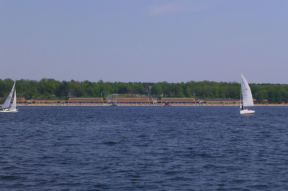 Sailboats and swimmers at Strandbad Wannsee, a Berlin lake beach that makes an easy heatwave escape