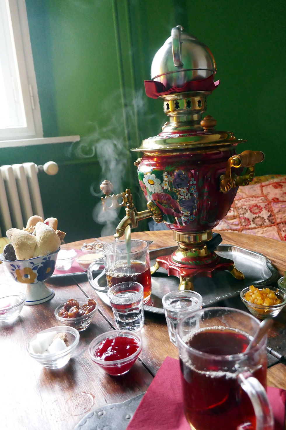 The cosy interior of the Tajik Tea Room off Oranienburger Strasse in Berlin, with a samovar and tea glasses on the table