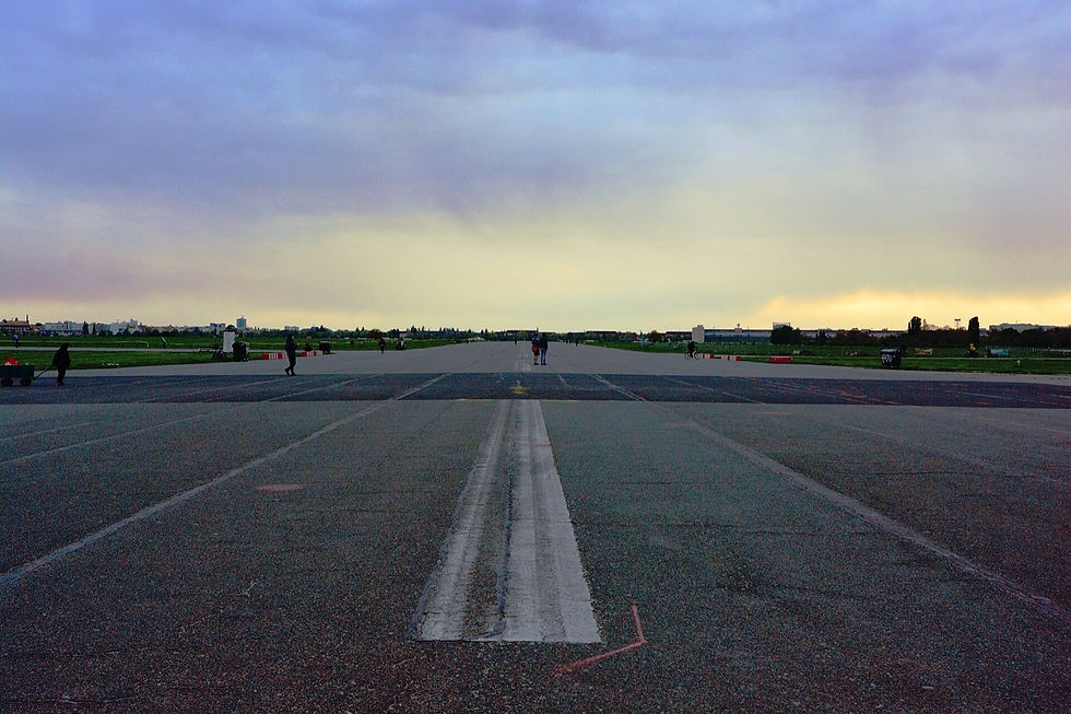 Former Tempelhof runway across Tempelhofer Feld on a spring evening.