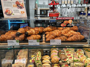 Berlin bakery counter with croissants, sandwiches and pastries ready for a quick tourist breakfast