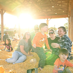 Kids having fun in a corn pit