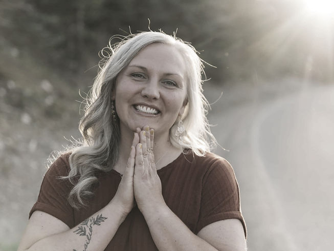 owner of stella web design with pray hands pleased to meet you