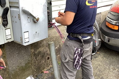 technicial rewiring electrical panel