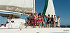 Group of solo travelers enjoying a boat day in Belize