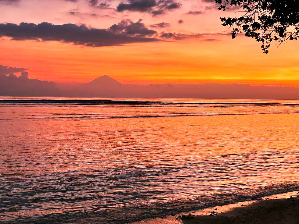 Stunning sunset over beach in Bali