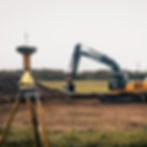 Excavator working on site with Topcon GPS system.